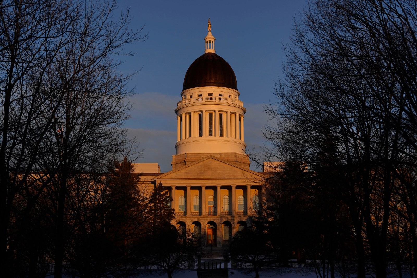 The Maine State House at sunrise on March 16, 2023, in Augusta. (AP Photo/Robert F. Bukaty, File)