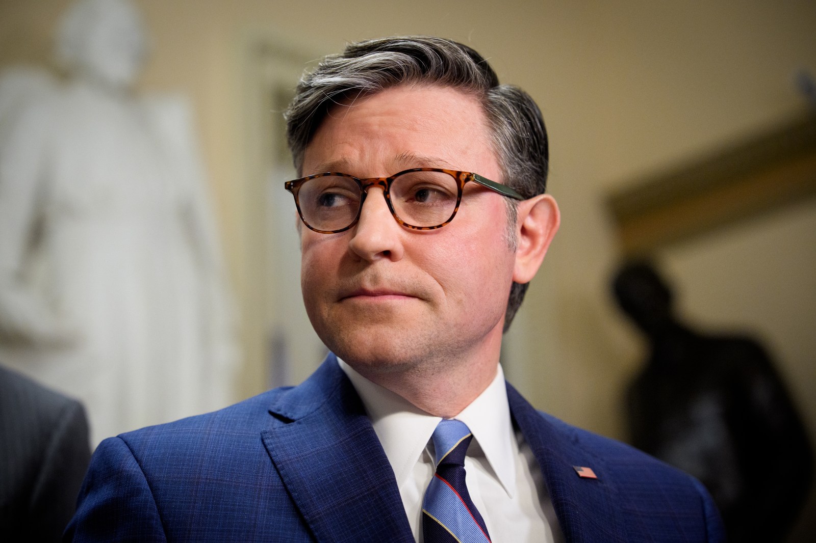 House Speaker Mike Johnson fields a question from a reporter following votes on Capitol Hill in Washington, D.C., on May 15. (Photo by Andrew Harnik/Getty Images)
